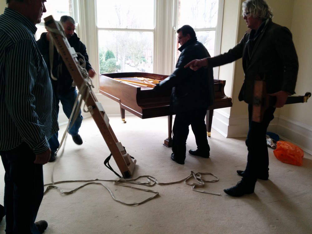Grand piano almost in place