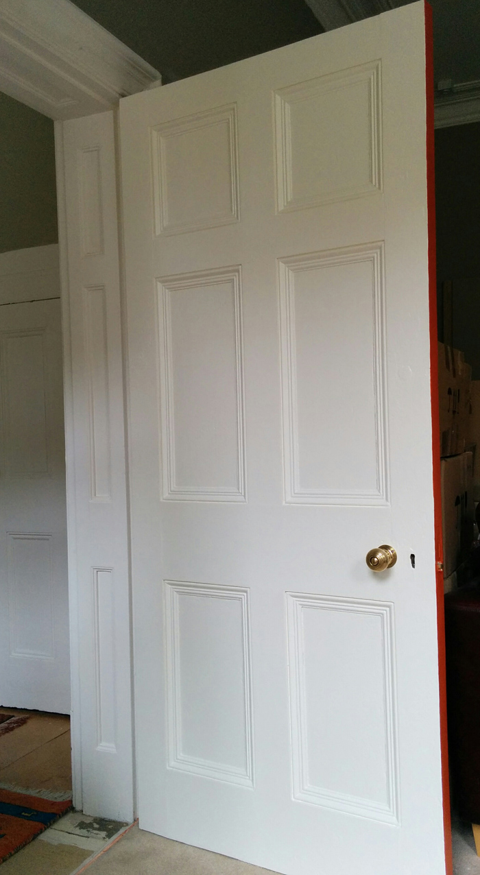 Living room door finished in Farrow & Ball Pointing
