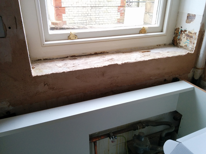 window cill - first fix plaster