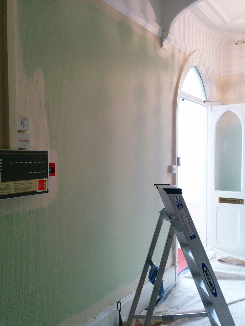 Painting the communal hall walls