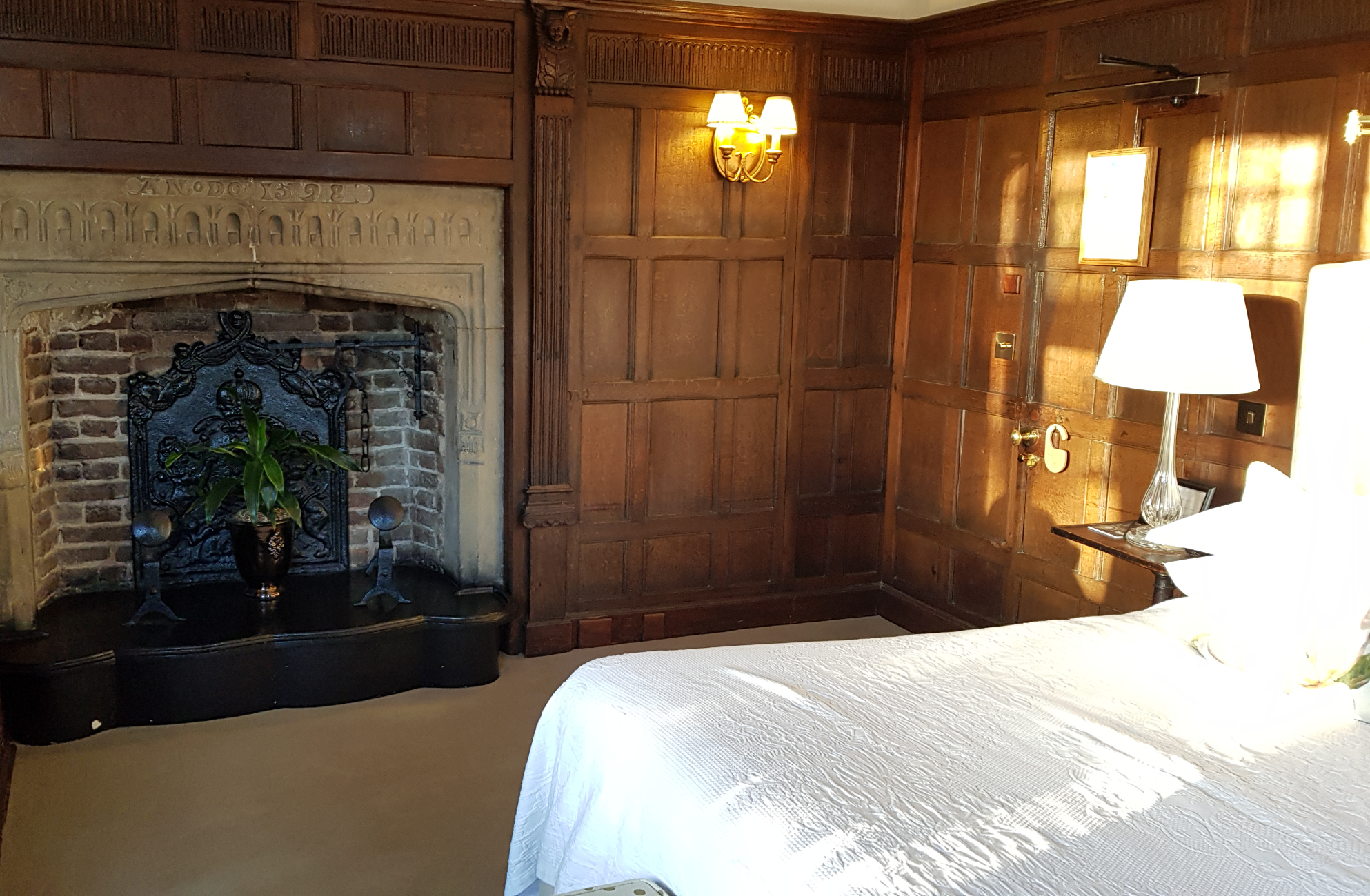 Gravetye fireplace in 'Magnolia' bedroom